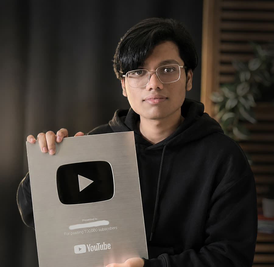 Ven holding a YouTube Silver Play Button